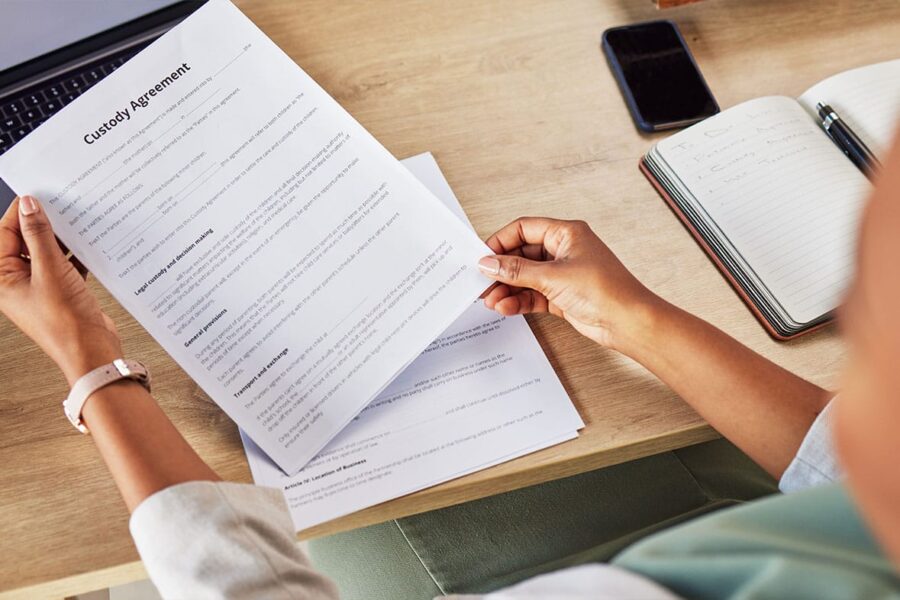 lawyer reviewing a child custody battle case in San Antonio