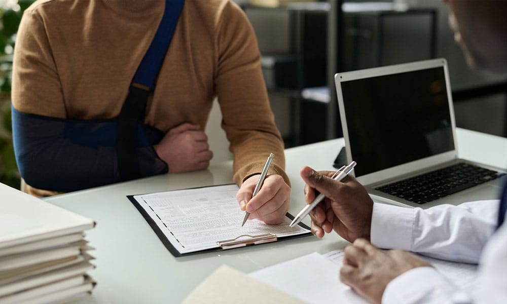 man meeting with a personal injury lawyer in San Antonio, TX