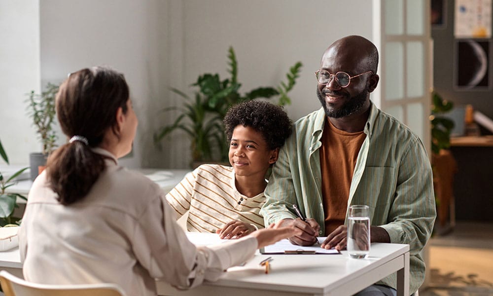 family lawyer meeting with a father and son in San Antonio, TX
